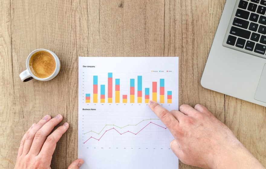 Self managed super funds pros and cons image of person pointing at graph
