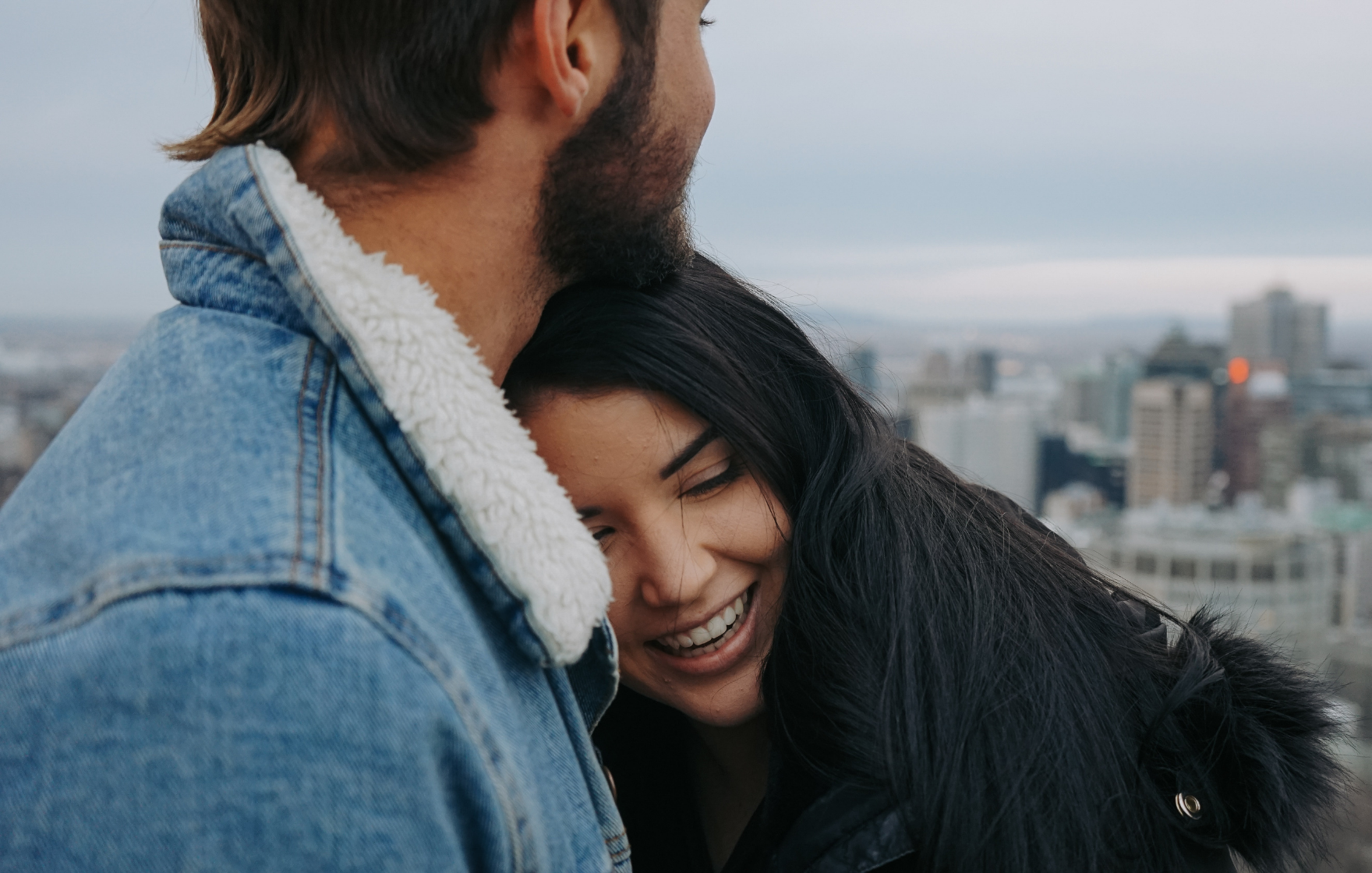 Money-saving tips for Millennials. Close up image of young couple travelling.
